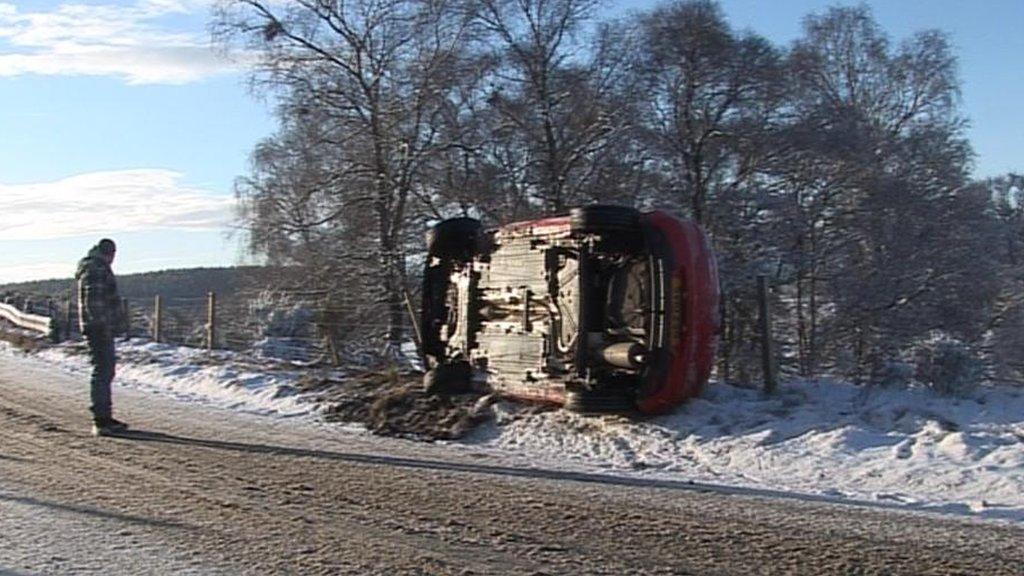 Overturned car on the A938