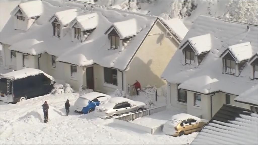 snow-covered houses on Arran