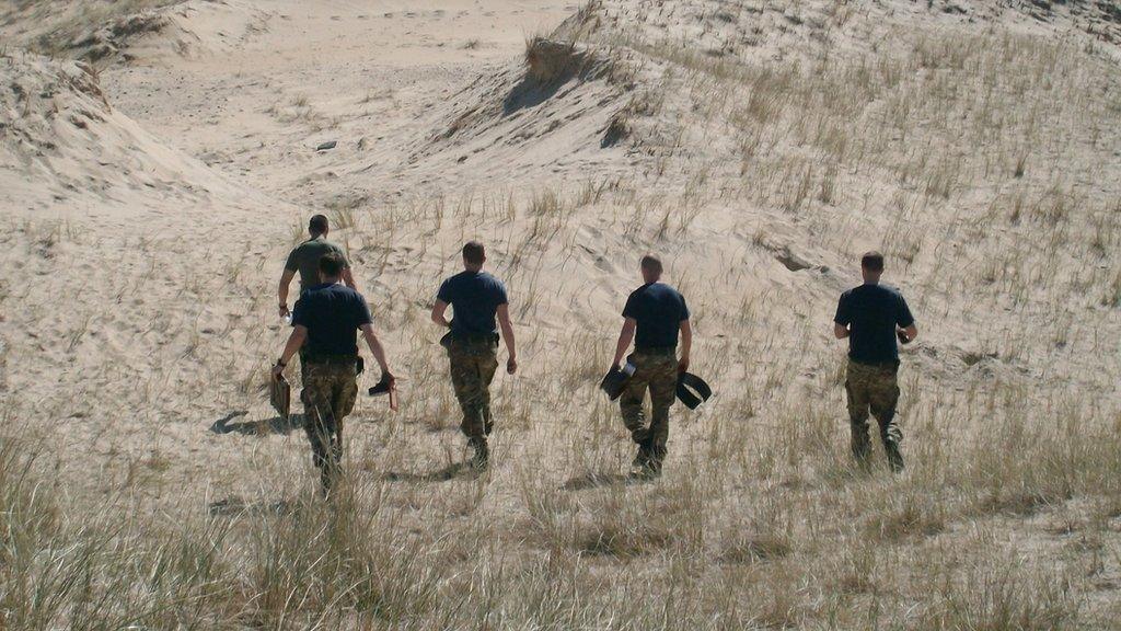 Members of the Royal Navy Explosive Ordnance Disposal team