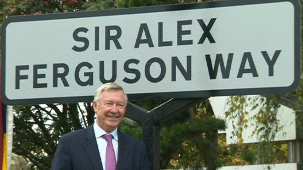 Sir Alex with sign