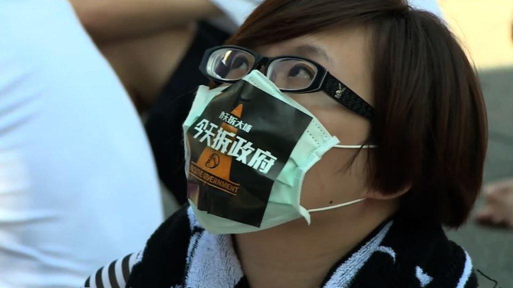 A protestor wearing a mask in Taiwan