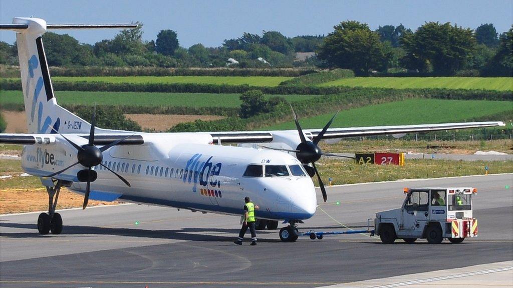 Flybe plane being pushed back at Guernsey Airport