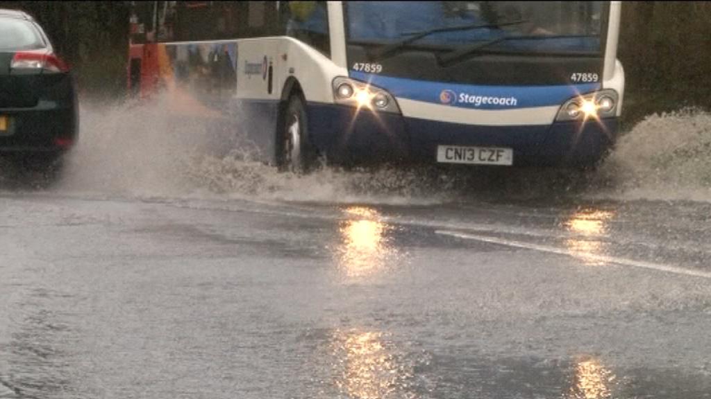 Bus going through flood water