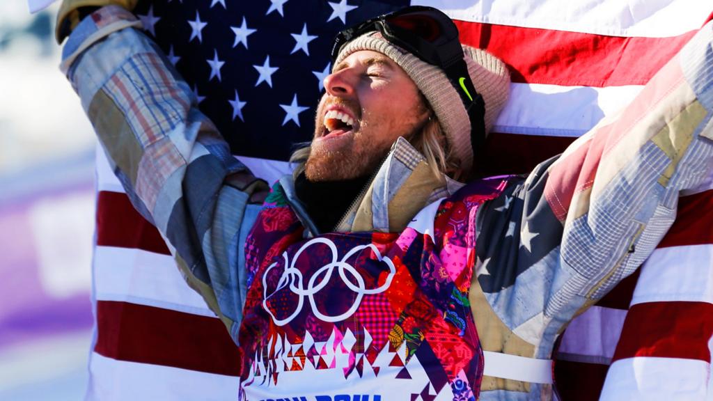 Sage Kotsenburg celebrates winning a gold medal