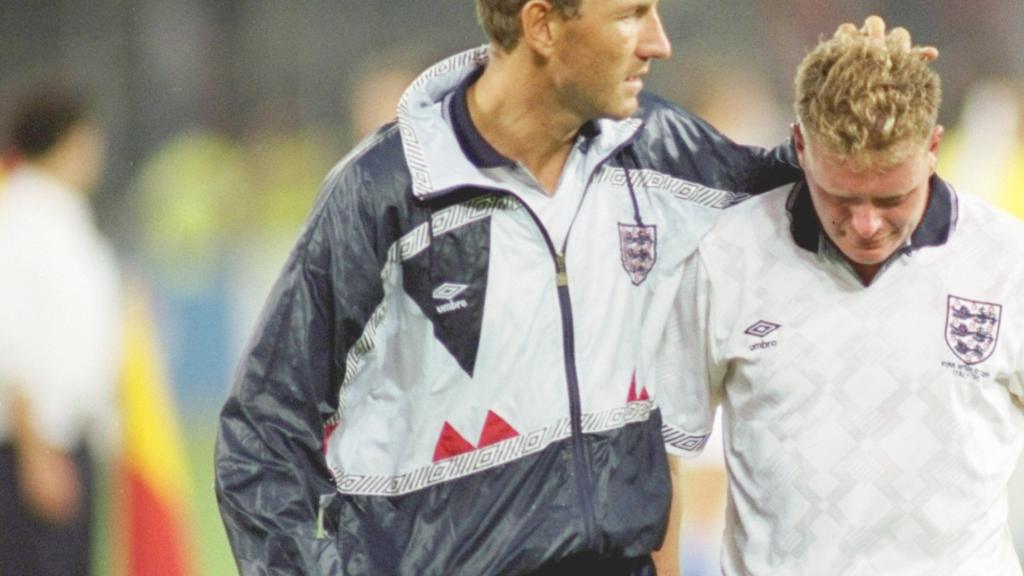 Paul Gascoigne is comforted by Terry Butcher following England's defeat to West Germany