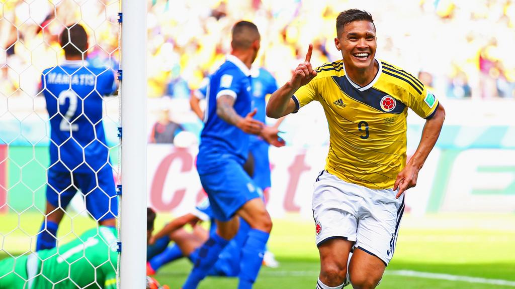 Teofilo Gutierrez celebrates after scoring Colombia's second goal against Greece