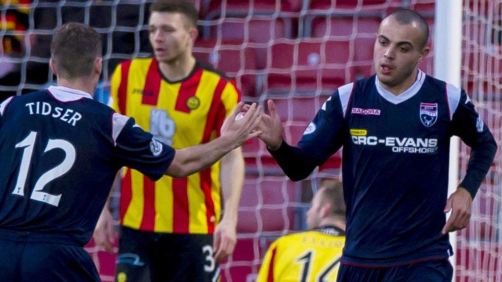 Michael Tidser congratulates Ben Gordon after he scores against Partick Thistle for Ross County