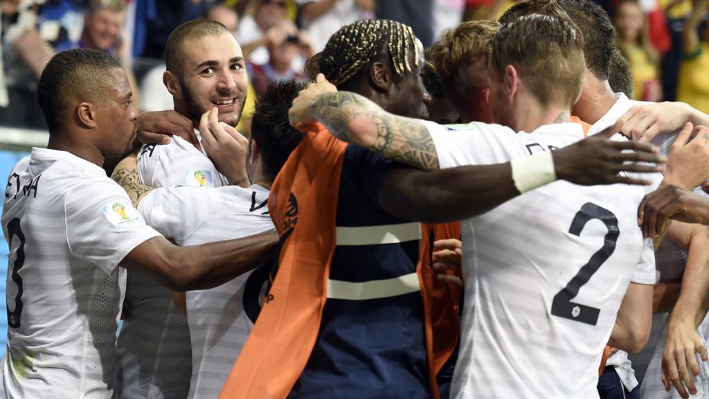 The French team celebrate in a huddle