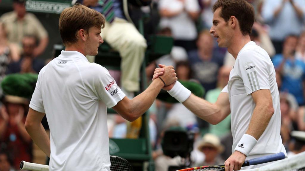 Andy Murray of Great Britain shakes hands at the net with David Goffin of Belgium following their match