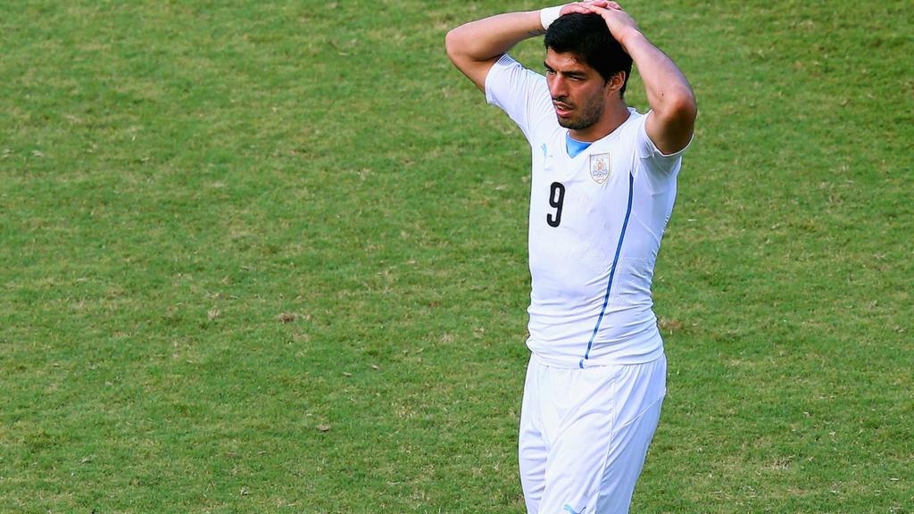 Luis Suarez of Uruguay reacts during the 2014 Fifa World Cup Brazil Group D match between Italy and Uruguay