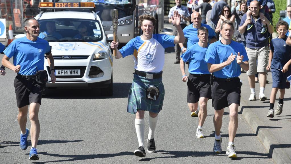 Calum MacIntyre with the baton