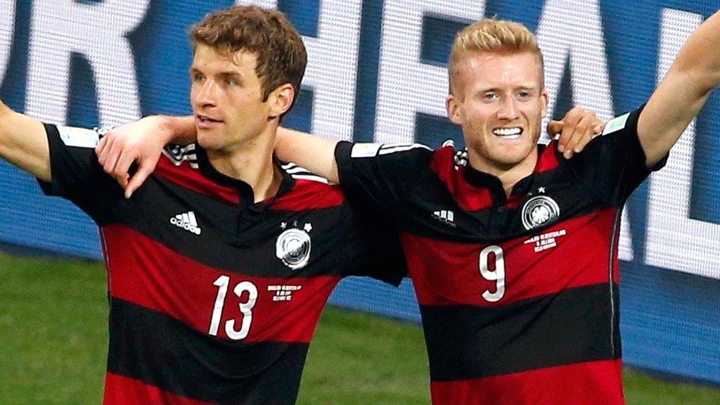 Germany's Thomas Muller and Andre Schurrle celebrate against Brazil