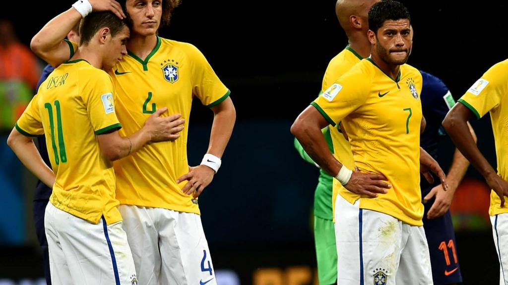 Hulk and David Luiz after Brazil lose to Netherlands