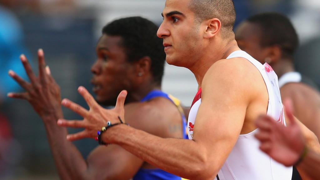 Adam Gemili of England makes it through to the 100m final