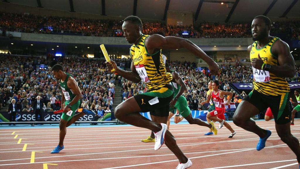 Usain Bolt competes in the Men"s 4x100 metres relay