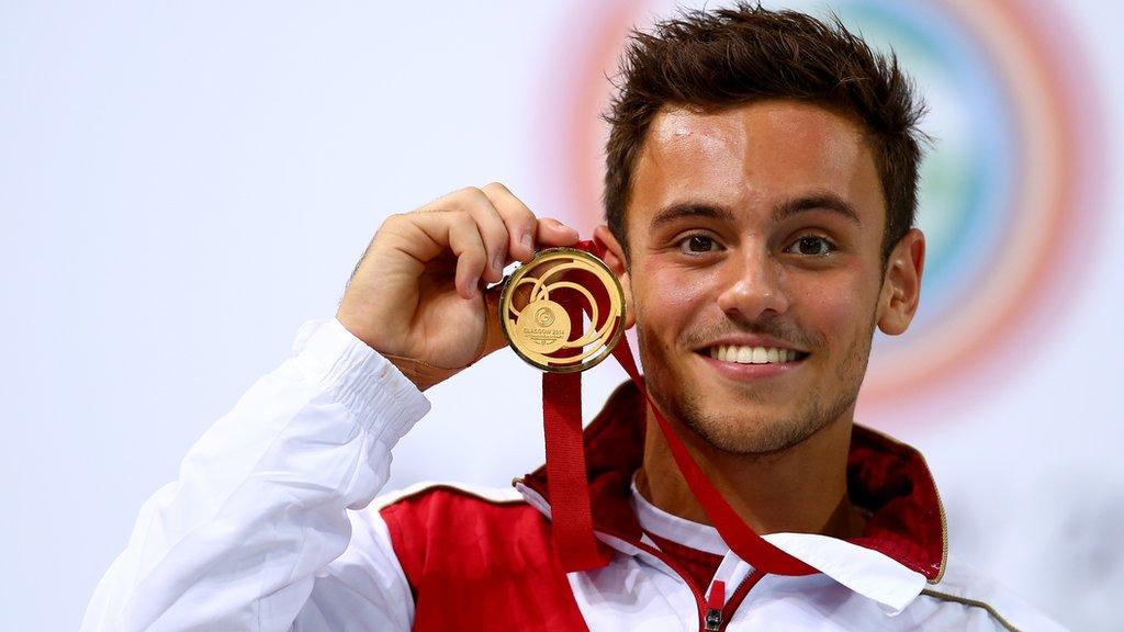 Tom Daley poses with his Commonwealth 10m platform diving gold