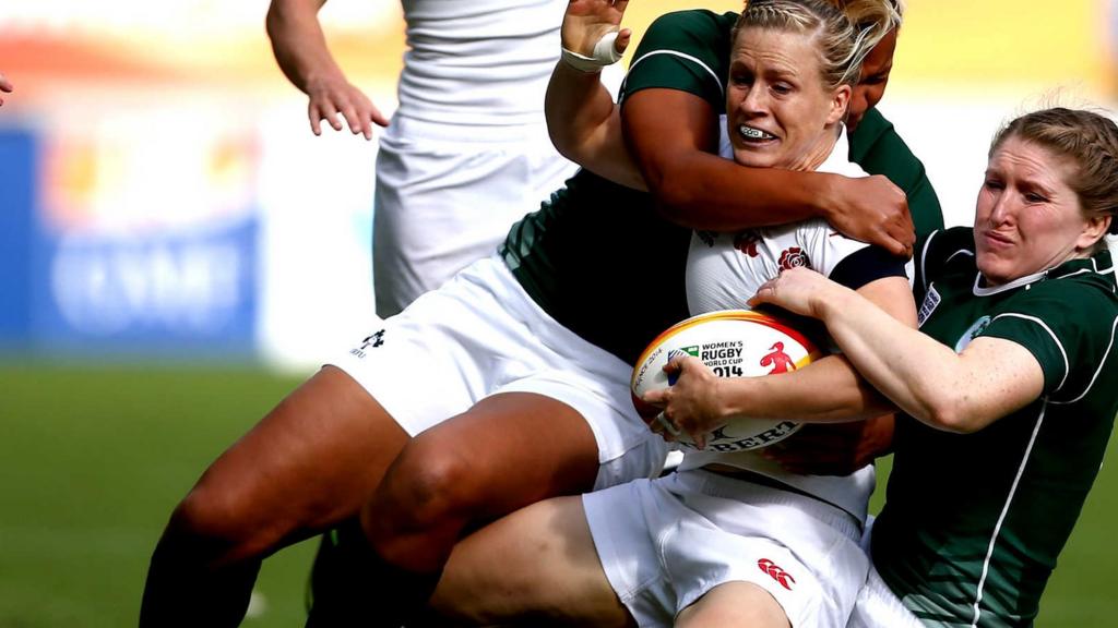 England's Danielle Waterman is tackled in the match against Ireland