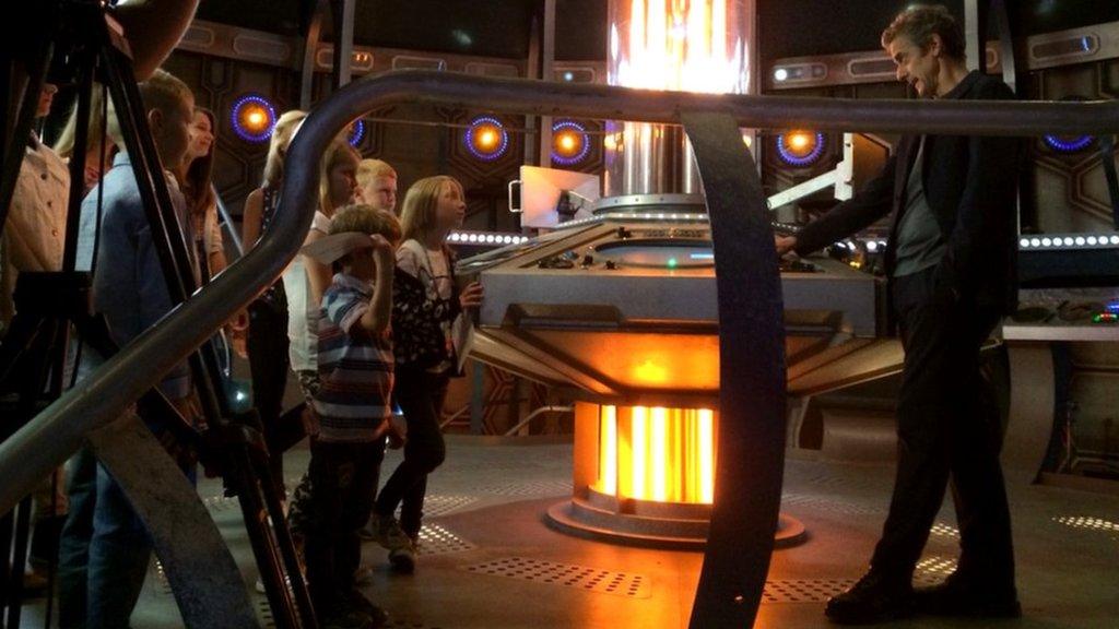 Peter Capaldi meets children on the Tardis set