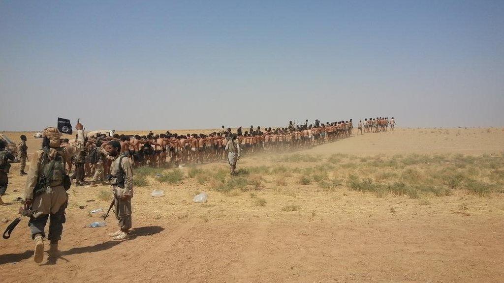 Photo posted online purportedly showing Syrian army soldiers in their underwear being led through the desert by Islamic State fighters (27 August 2014)