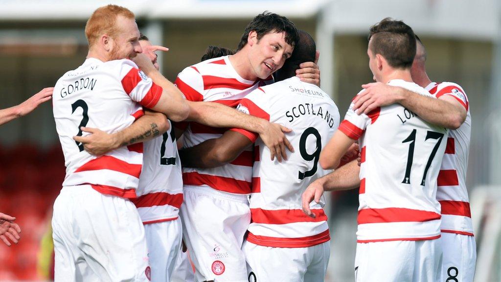 Jason Scotland is congratulated by Martin Canning after scoring Hamilton's fourth