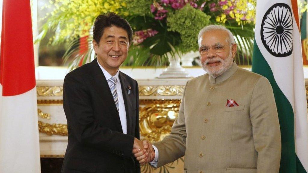 Indian PM Narendra Modi and Japan's PM Shinzo Abe shake hands before their talks at the state guest house in Tokyo Monday, Sept. 1, 2014