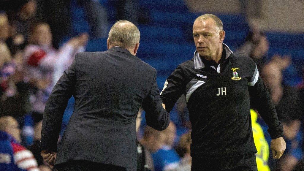 Inverness CT manager John Hughes shakes hands with Rangers boss Ally McCoist