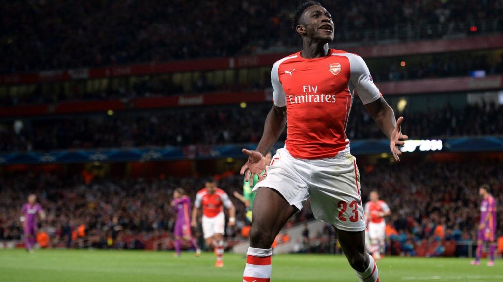 Danny Welbeck celebrates a hat-trick for Arsenal