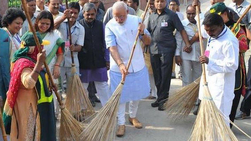 PM Modi wields the broom