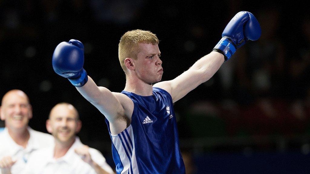 Charlie Flynn celebrates after beating Joe Cordina in the Commonwealth Games