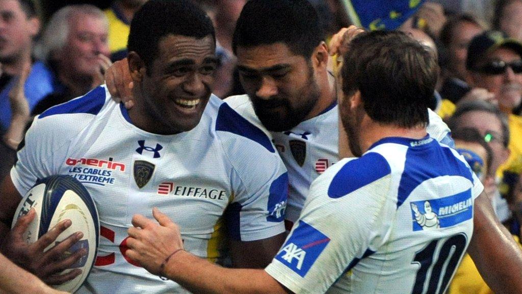 Napolioni Nalaga (left) celebrates with number 10 Camille Lopez after claiming the latter's kick to score