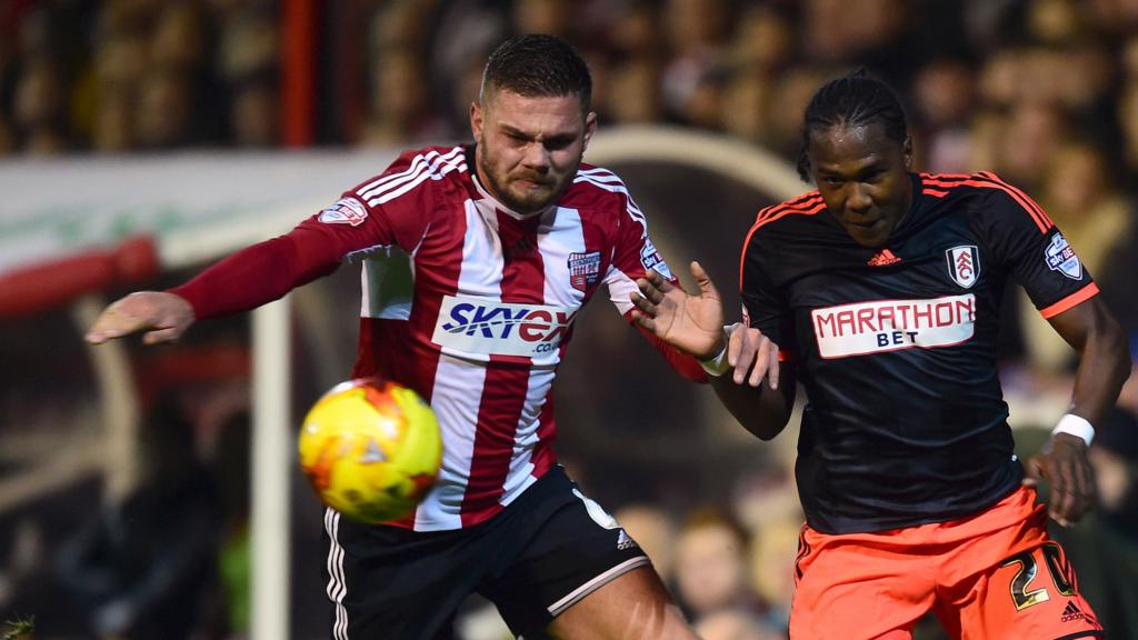 Brentford's Harlee Dean and Fulham's Hugo Rodallega
