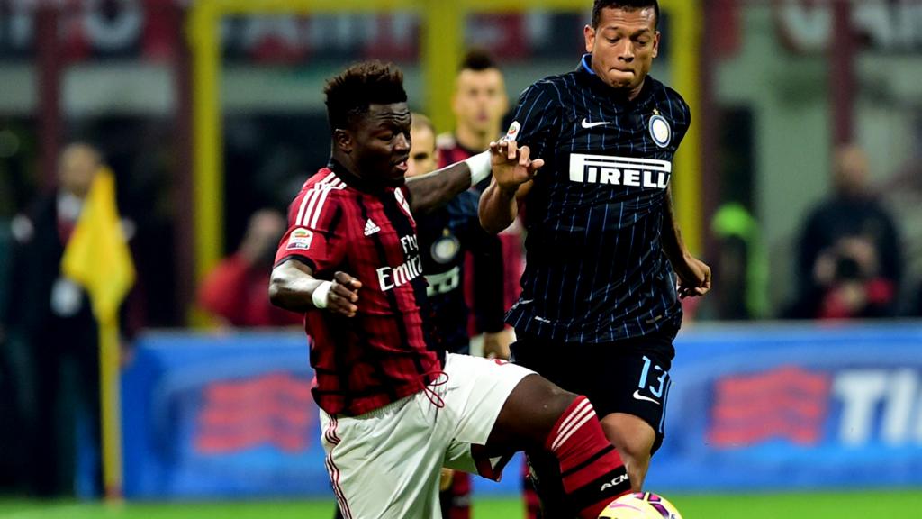 AC Milan's Sulley Muntari and Inter's Fredy Guarin