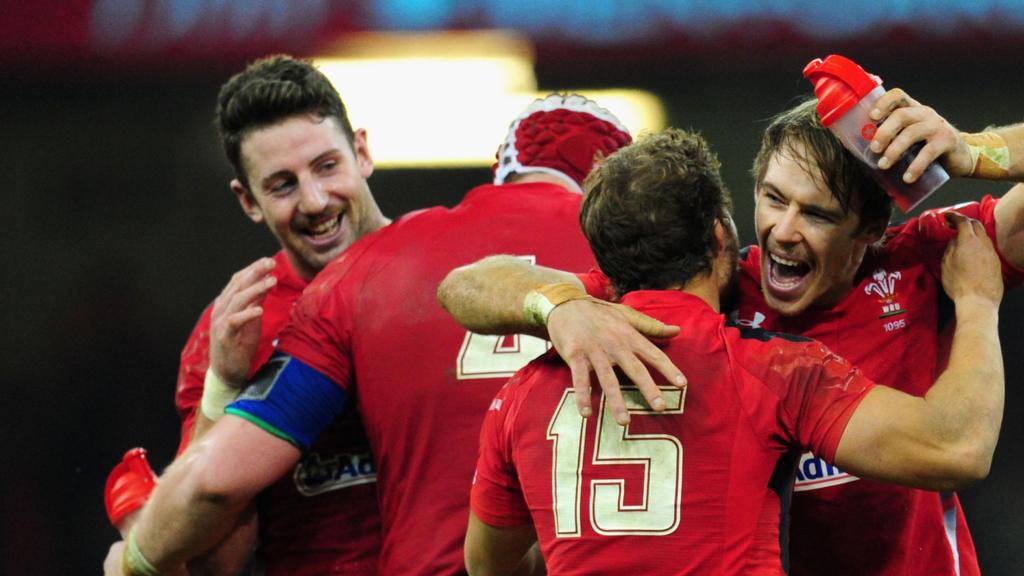 Wales players celebrate after beating South Africa