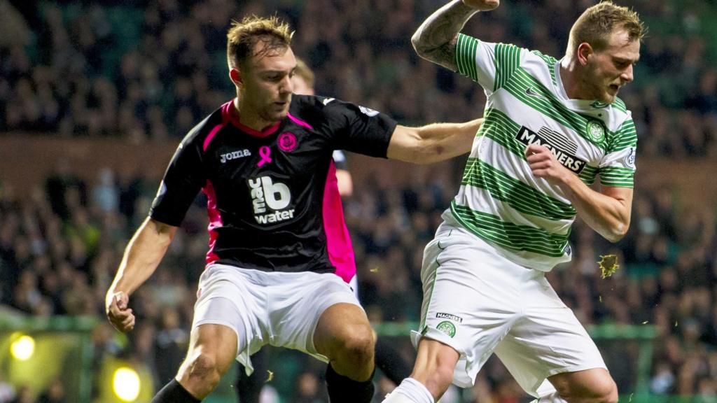 Celtic striker John Guidetti and Partick defender Conrad Balatoni