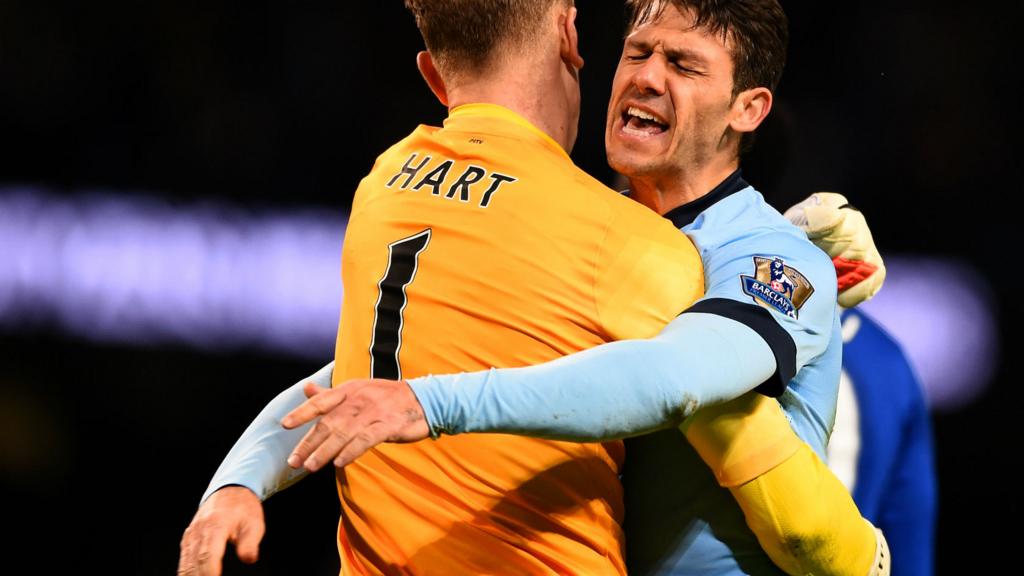 Joe Hart celebrates with Martin Dimichellis