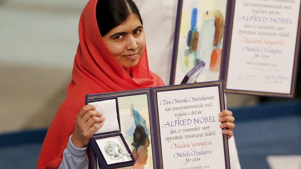 Nobel Peace Prize laureate Malala Yousafzai receives the medal and the diploma during the Nobel Peace Prize awards ceremony at the City Hall in Oslo, 10 December 2014