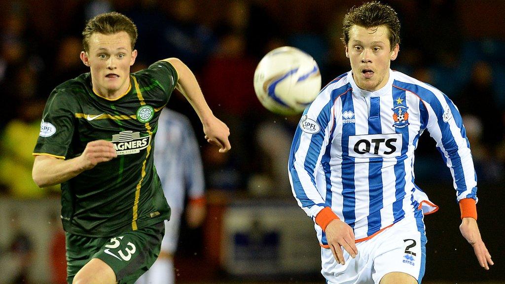 Celtic's Liam Henderson chases down a loose ball with Ross Barbour