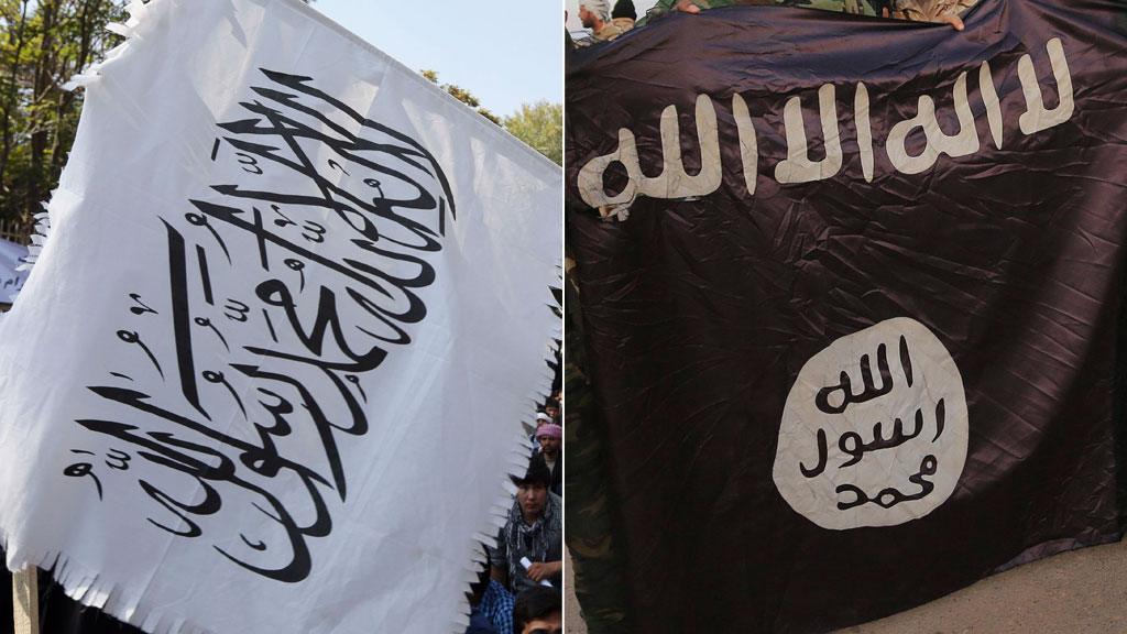 The White flag of the Taliban and the black flag of Islamic State