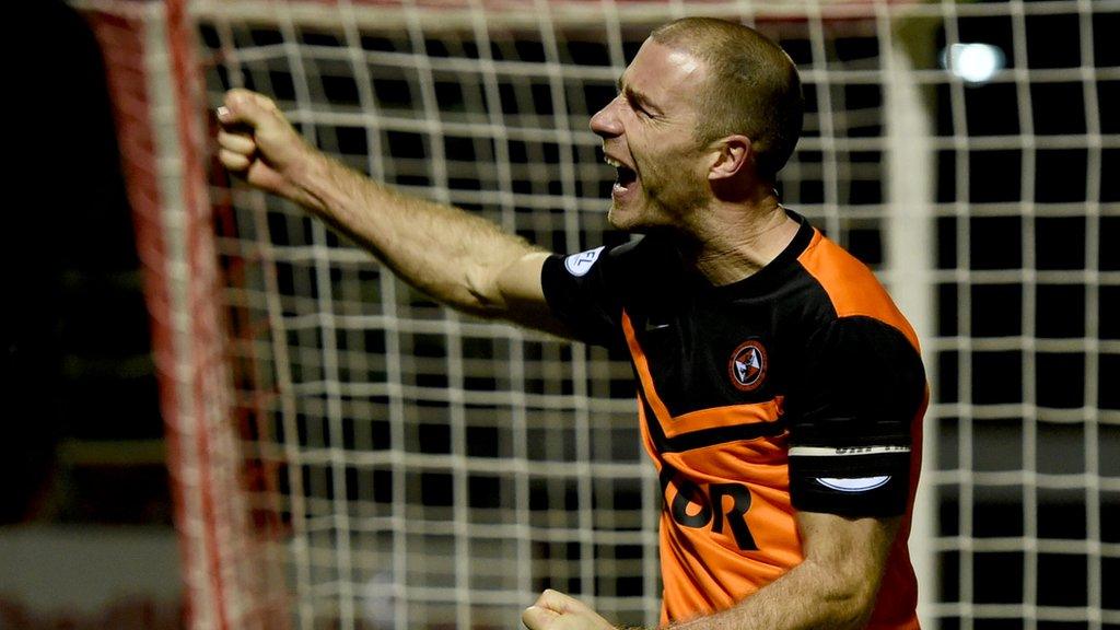 Sean Dillon celebrates his winning goal for Dundee United