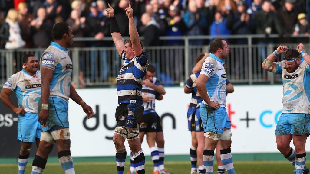 Bath celebrate as the Glasgow players look on dejected