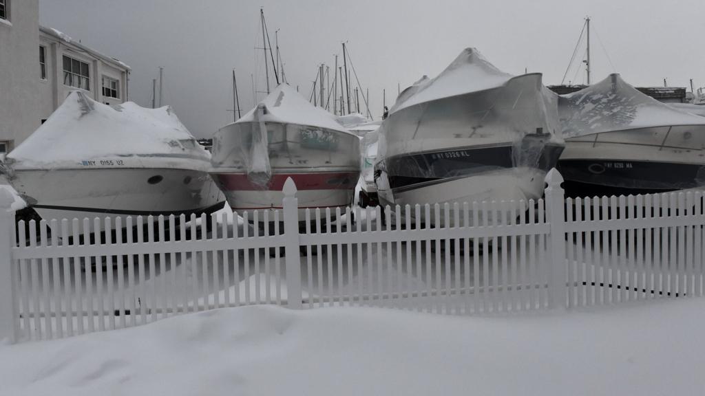 Dry docked boats are covered with snow January 27, 2015 in the Bronx borough of New York City