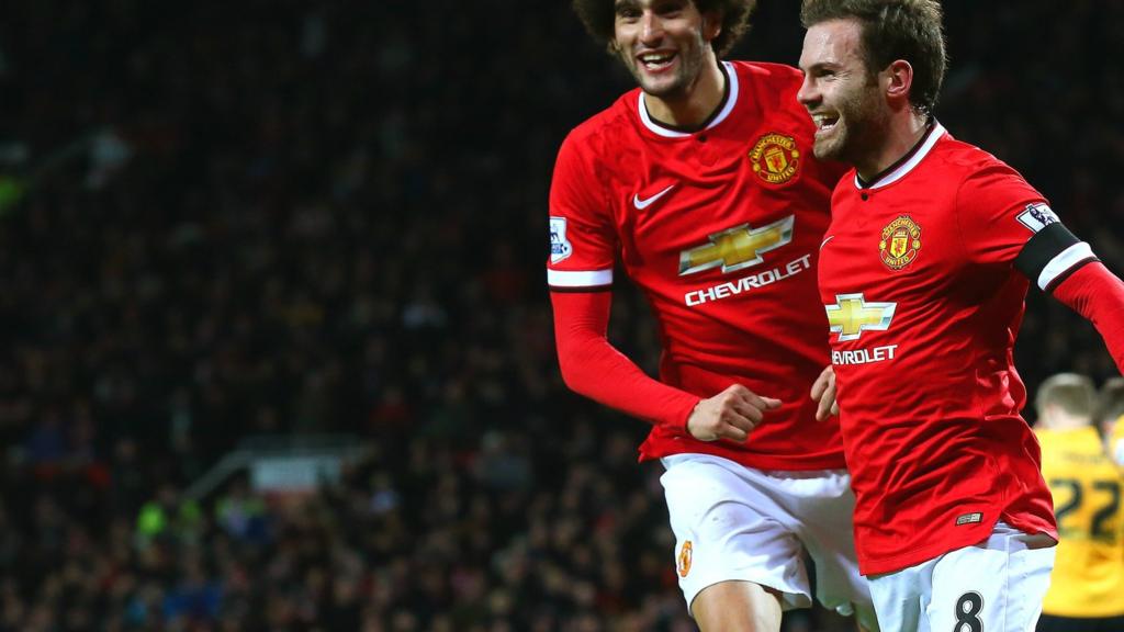 Juan Mata celebrates