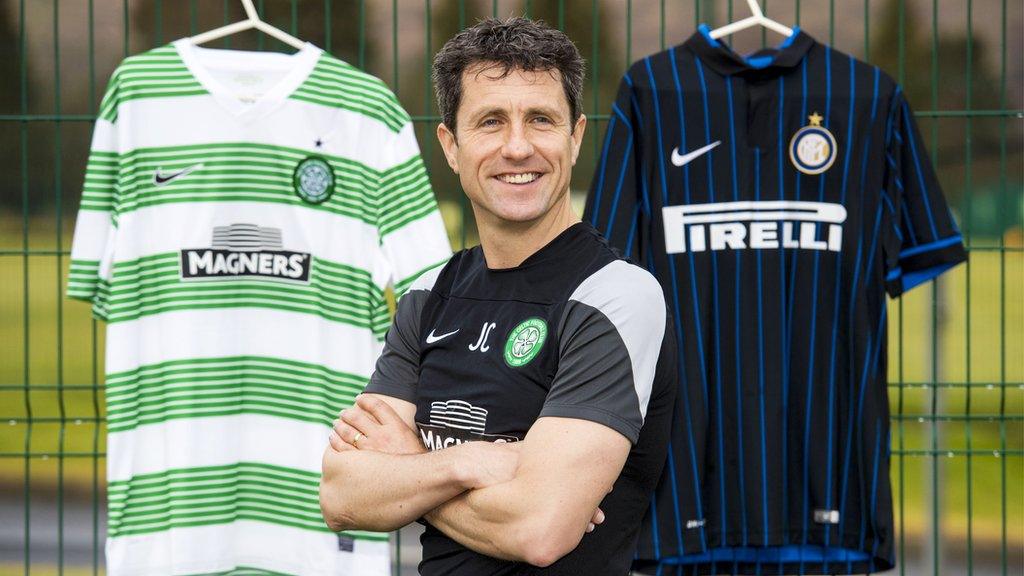 John Collins poses with Celtic and Inter Milan jerseys