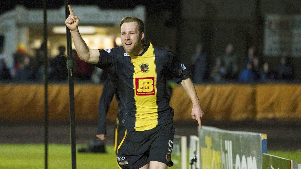 Darren Lavery celebrates scoring against Spartans