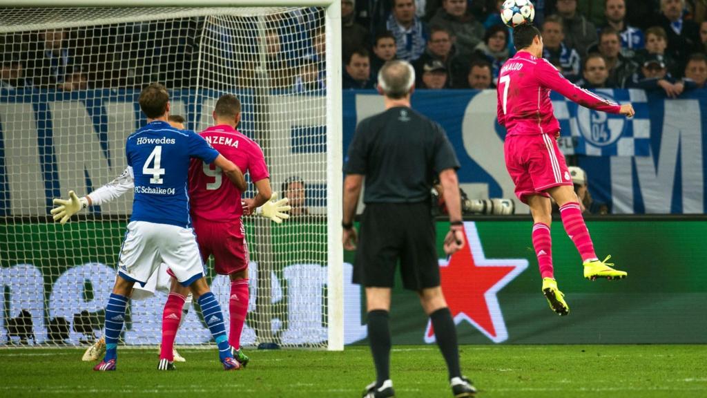 Cristiano Ronaldo heads towards goal