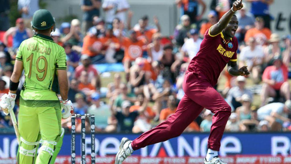 Jason Holder celebrates
