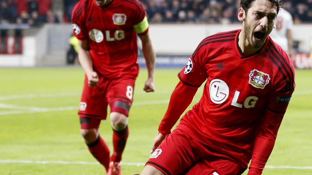 Hakan Calhanoglu celebrates