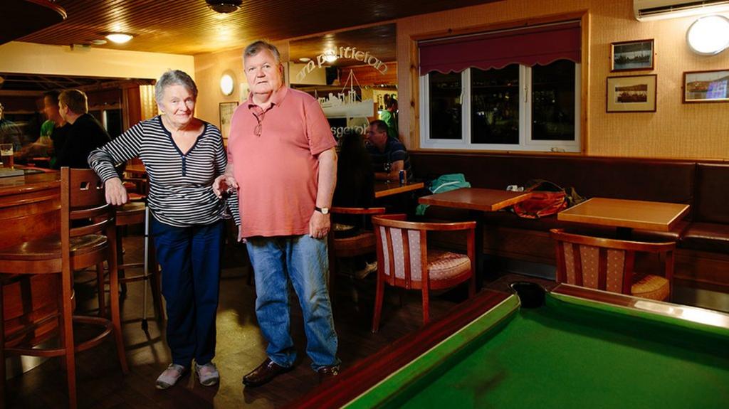 Mary and Alistair Johnston pictured in the Am Politician pub, Eriskay