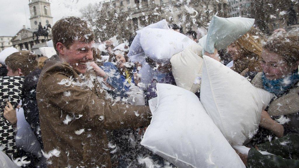 Participants take part in International Pillow Fight Day in Trafalgar Square in London April 4, 2015.