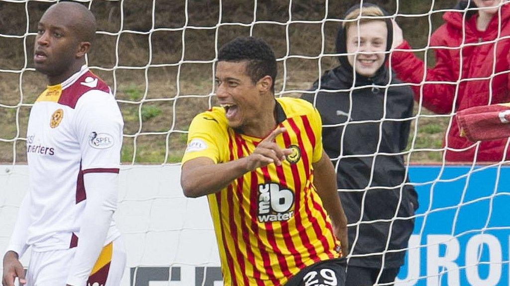 Partick Thistle forward Lyle Taylor celebrates